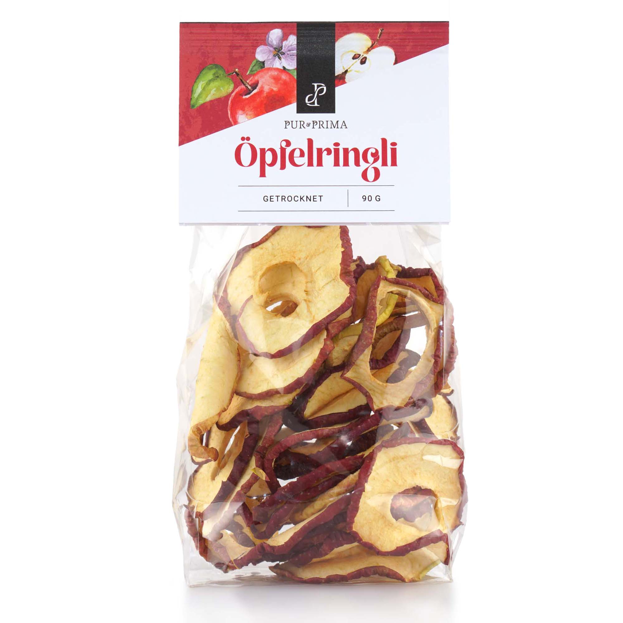 Ein transparenter 90-g-Kunststoffbeutel mit getrockneten Pur & Prima-Apfelringen mit roter Schale und einem weiß-roten Kopfetikett.
