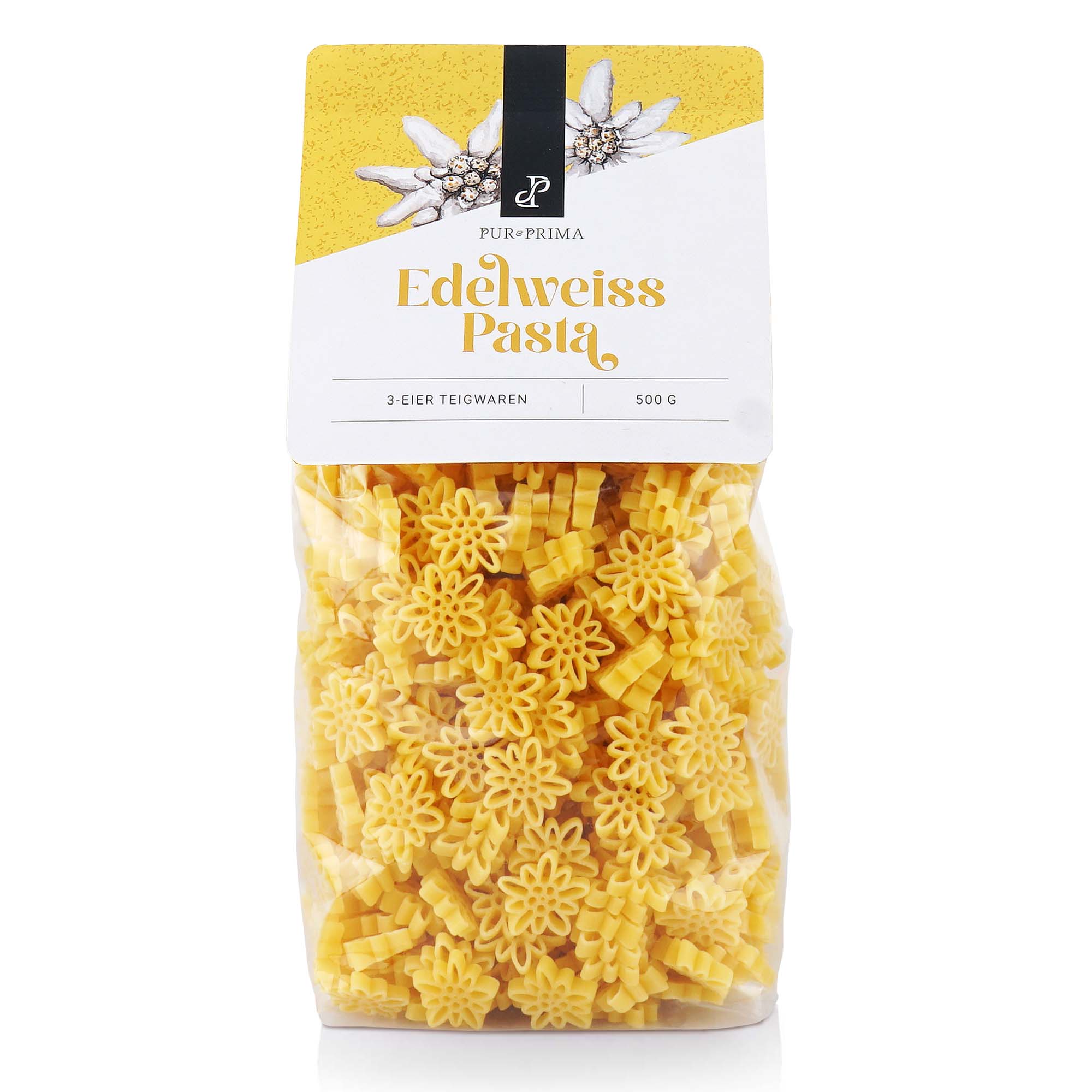 Eine transparente 500-g-Plastiktüte Pur & Prima Edelweiß-Pasta mit gelben, blütenförmigen Eiernudeln im Inneren.