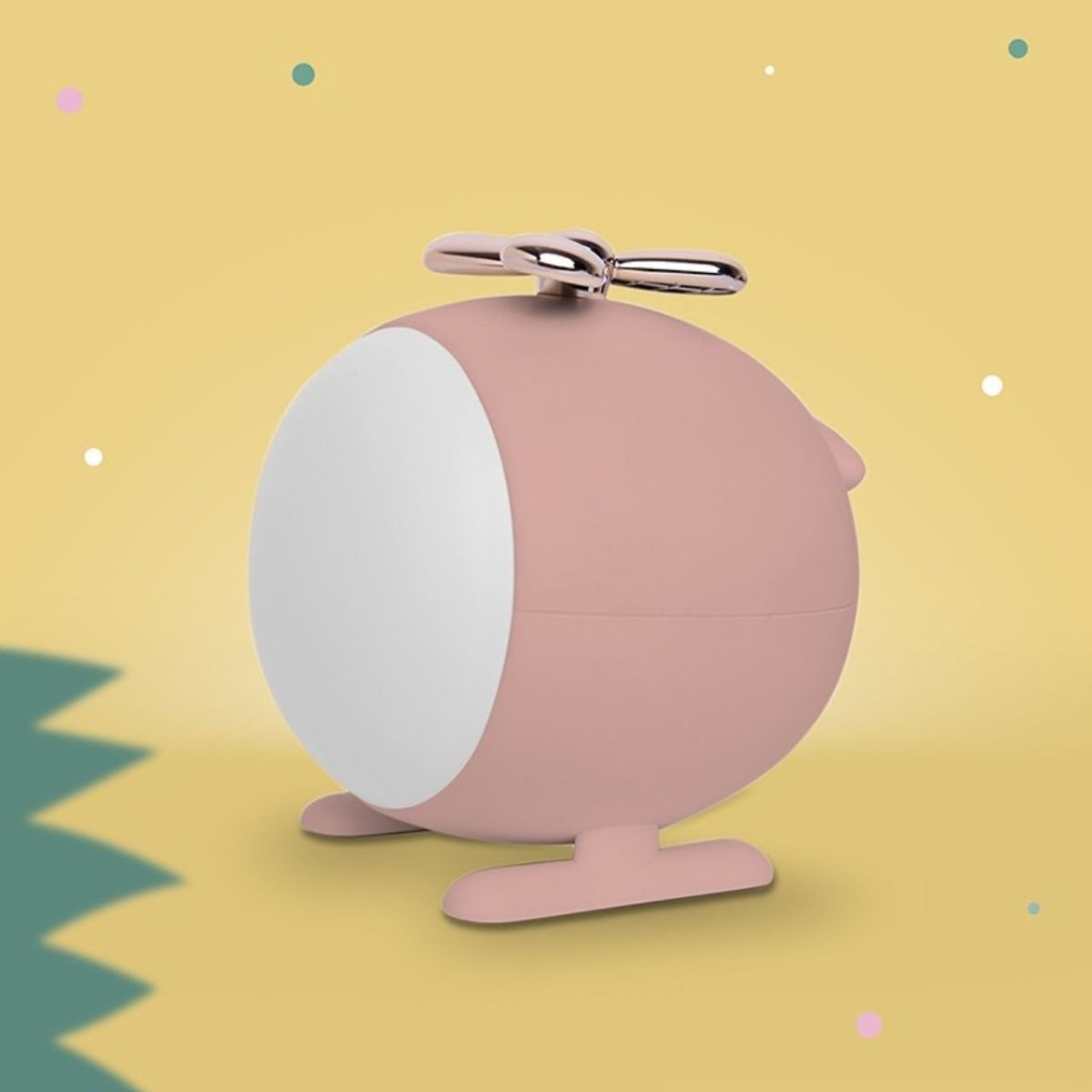 amelihopper, pink round object, metal top, white front, yellow background